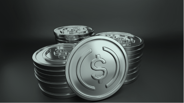 Monete stilizzate con simbolo del dollaro, rappresentazione grafica di stablecoin USDC.